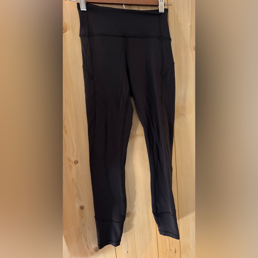 Lululemon black leggings size 4